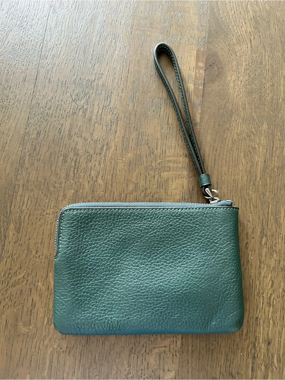 Coach carriage embossed green wristlet leather